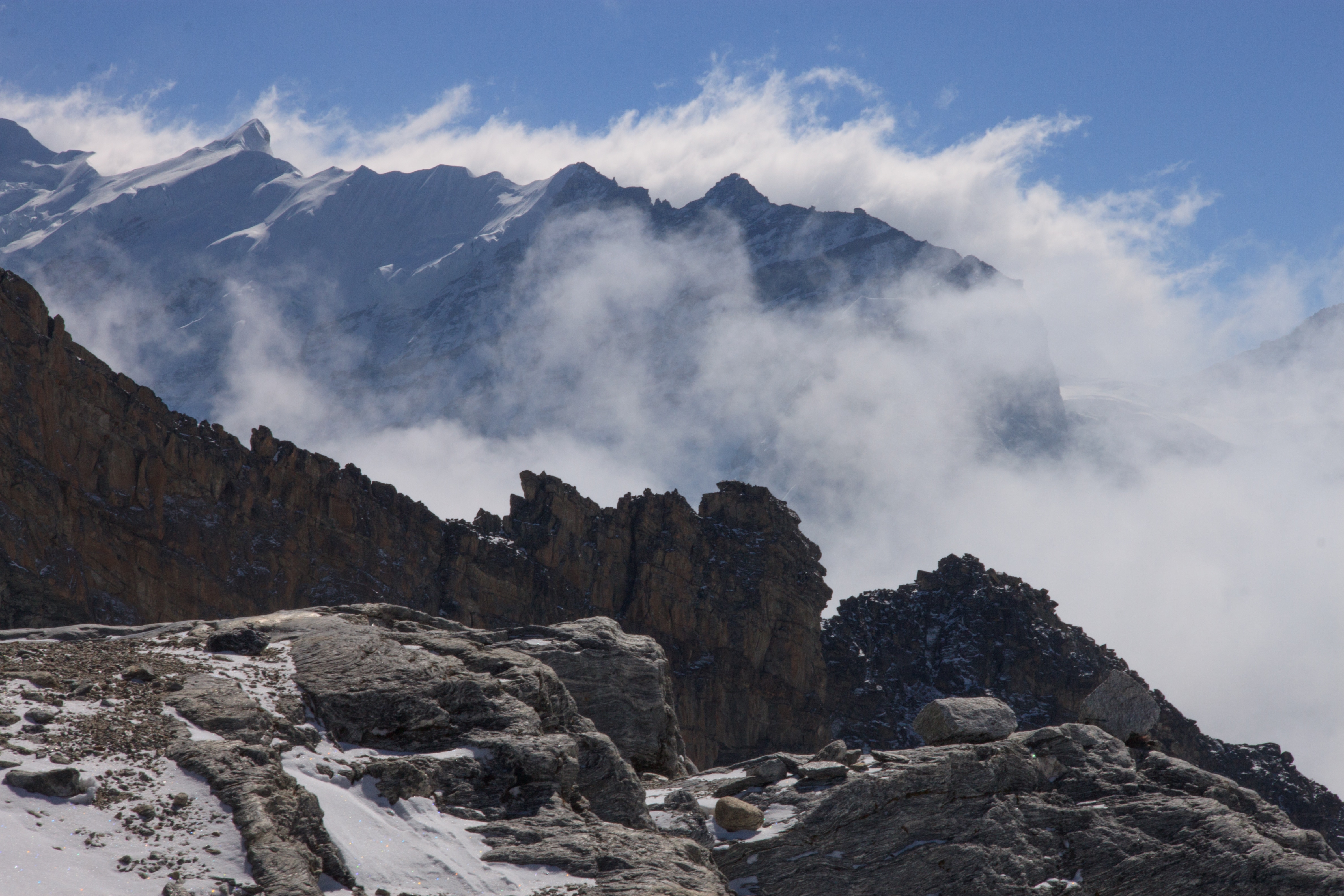 Clouds swirl around the peaks at Base Camp