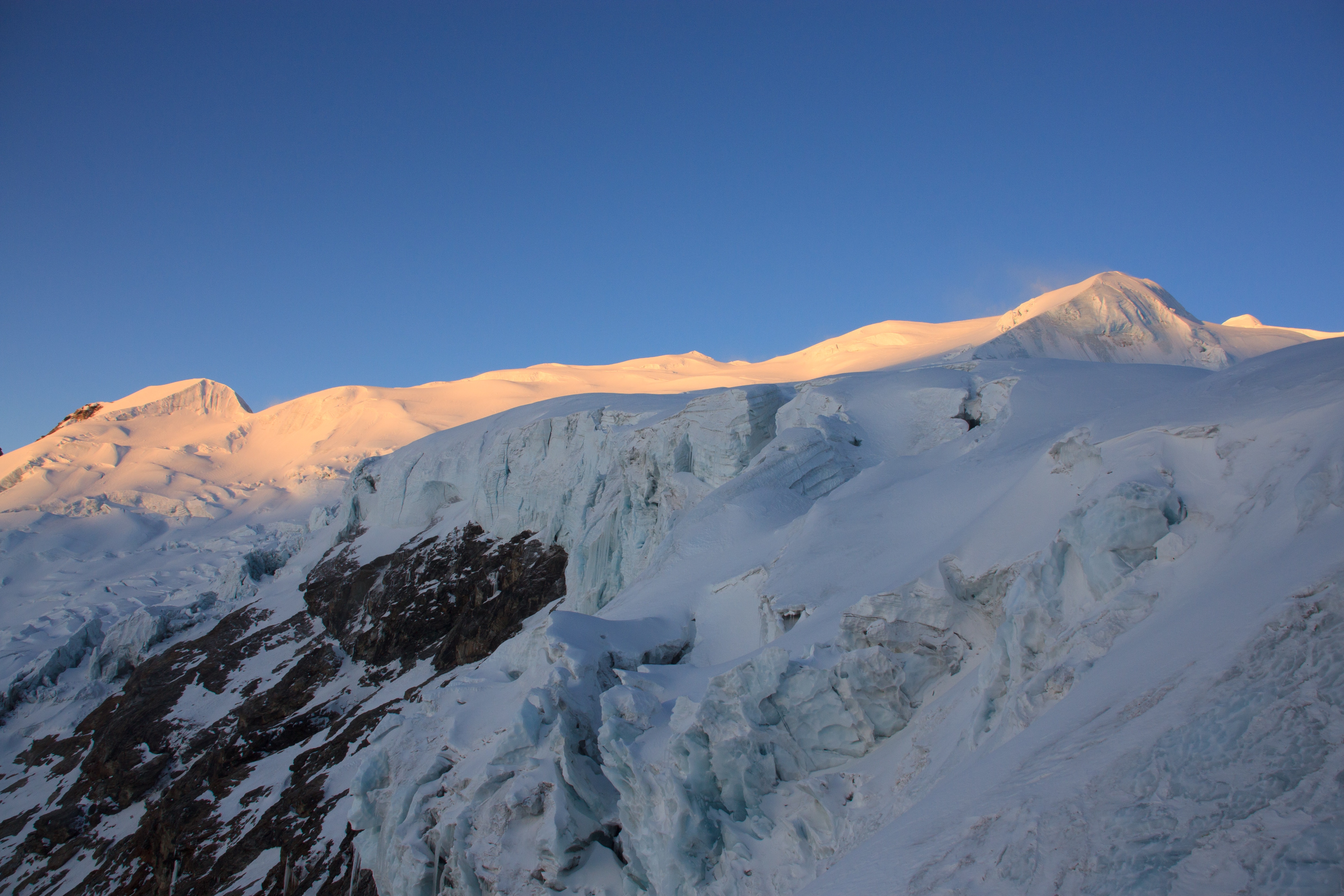 Looking towards the summit at sunrise from High Camp
