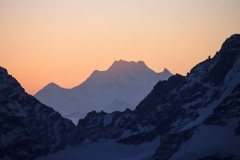 Peeking out of the tent at High Camp at sunrise