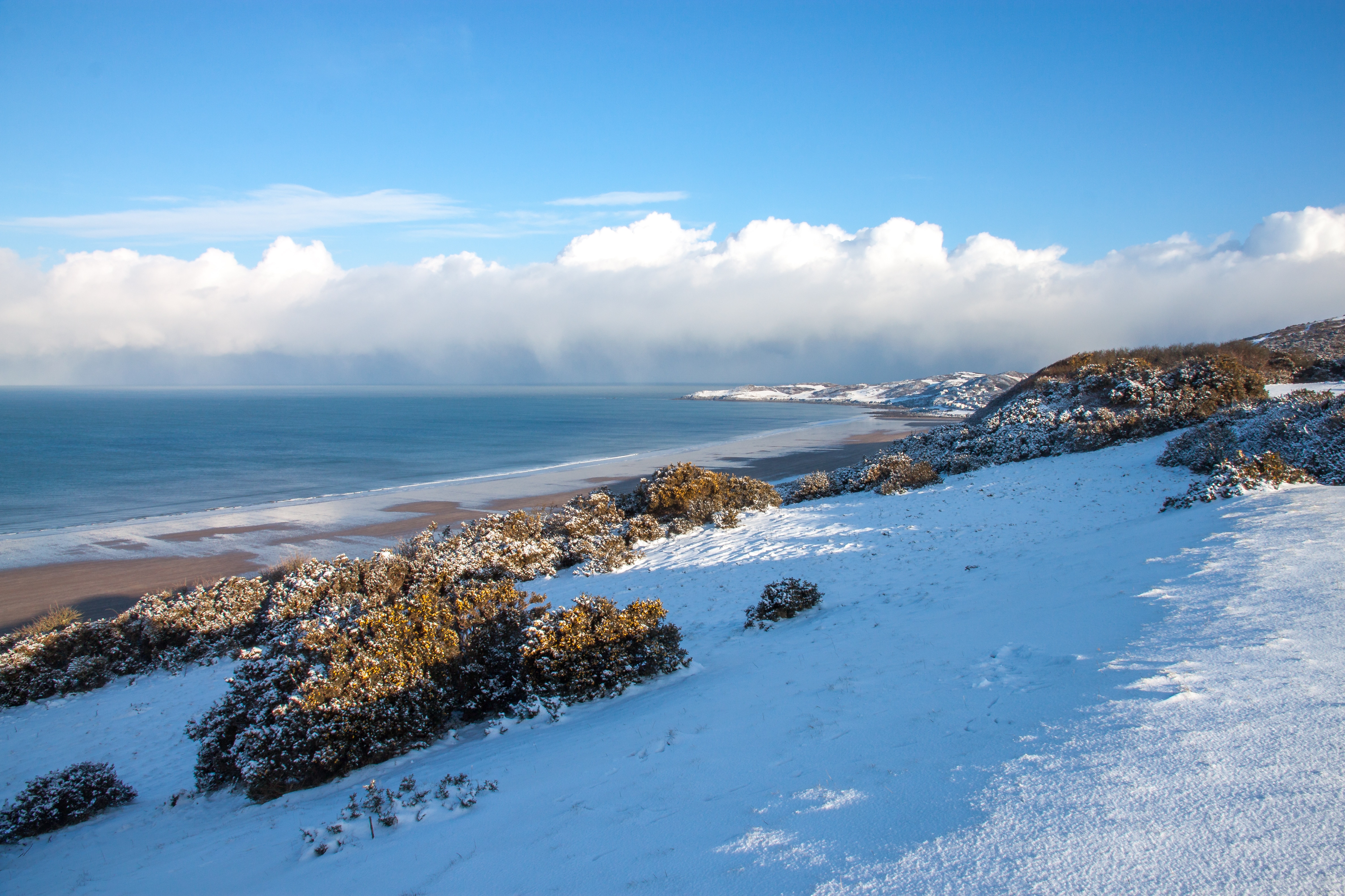 Woolacombe Beach and Mort Point from Pickwell with snow